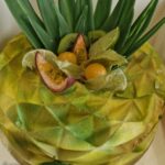 Entremets biscuit citron vert, mousse coco, insert tutti frutti